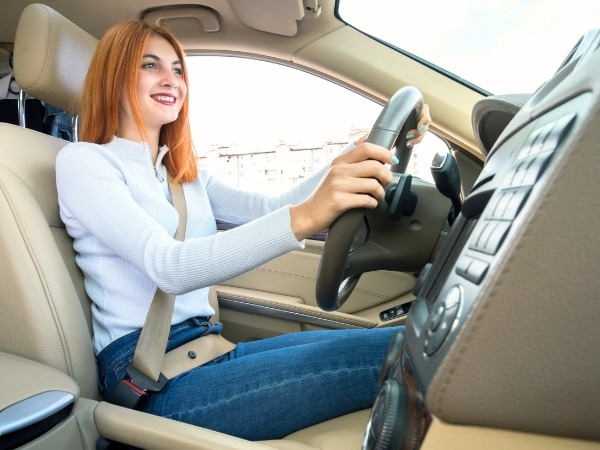 Woman Driving a Car