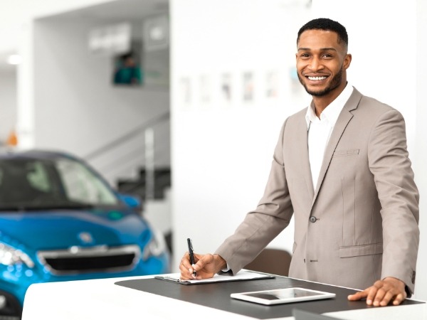 Car Rental Agent with Blue Car