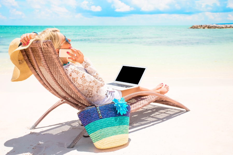 Woman Working at a Beach