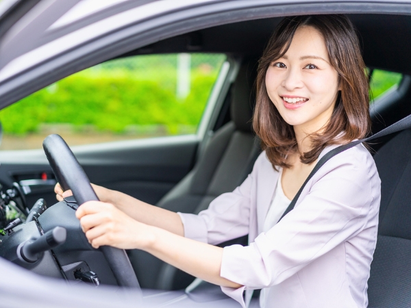 Woman with a Rental Car