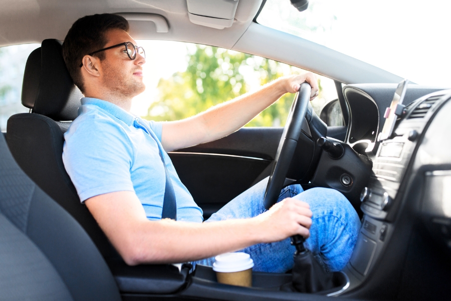 Man Driving a Car